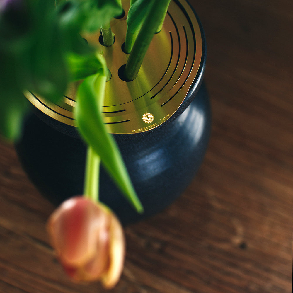 Close up of a bouquet arranged with the Flower Constellation L - brass flower tools designed by House of Thol / photograph by Masha Bakker