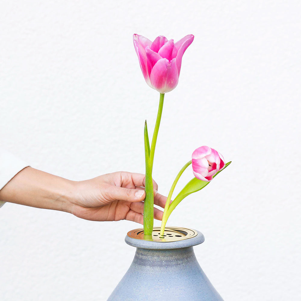 Arranging flowers with the Flower Constellation M - brass flower tools designed by House of Thol / photograph by Gaav Content