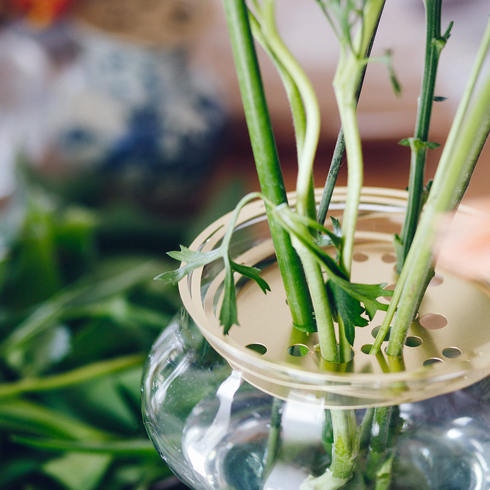 Close up of a bouquet arranged with the brass Ophiuchus / Flower Constellation XL - flower tools for effortless arrangements with fewer flowers - design by House of Thol / Photograph by Masha Bakker