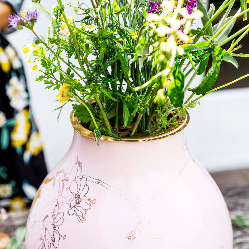 Close up of a bouquet of wildflowers being arranged with the Flower Constellation XL - flower tools for effortless arrangements with fewer flowers - design by House of Thol / Photograph by Gaav Content