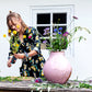 Jana arranging a bouquet of wildflowers with the Flower Constellation XL - flower tools for effortless arrangements with fewer flowers - design by House of Thol / Photograph by Gaav Content