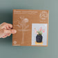 Packaging Flower Constellation XL held in hand - flower tools for effortless arrangements with fewer flowers - design by House of Thol / Photograph by Masha Bakker photography