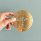 Hand with Cygnus / Flower Constellation M - brass flower tools designed by House of Thol / photograph by Masha Bakker photography